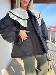 Piumino collo Peter Pan